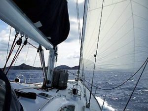 UNder sail approaching dive site of RMS Rhona